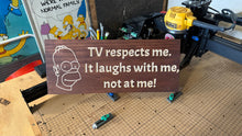 Load image into Gallery viewer, “Tv respects me. It laughs with me, not at me” - sign