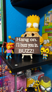 Hang on I'll buzz you in. BUZZ! Sign
