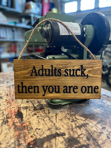 Adults suck, then you are one sign