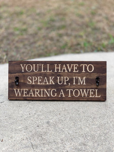 You'll have to speak up, I'm wearing a towel sign