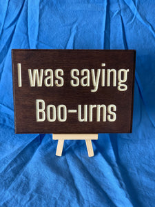I was saying boo-urns Sign