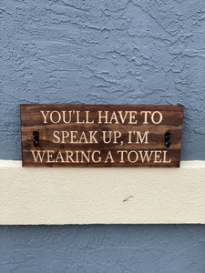 You'll have to speak up, I'm wearing a towel sign