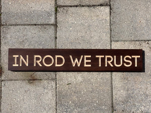 In Rod We Trust sign