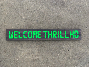 WELCOME THRILLHO w/ green sign