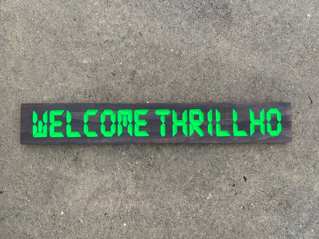 WELCOME THRILLHO w/ green sign