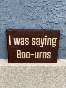 I was saying boo-urns Sign